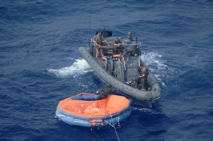 orange-raft-blue-water